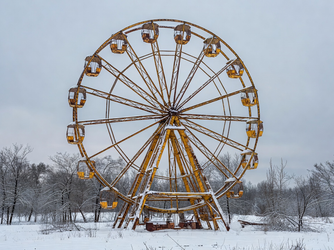 Pripyat yellow Ferris wheel standing rusted in winter